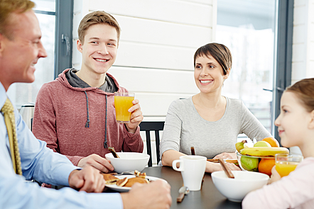 Family eating a health breakfast together