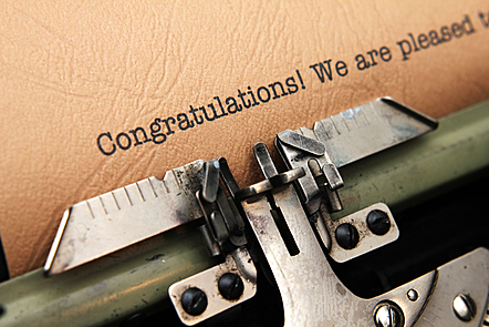 The word congratulations written by a type writter