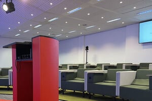 A lecture hall equipped with camera and projector for facilitating blended and hybrid classes in higher education.