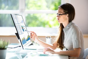 A women working on digital dashboard technology