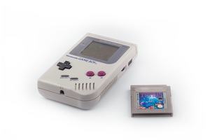 Game design course image: a Nintendo Game Boy and a Tetris cartridge, representing 8-bit video game music