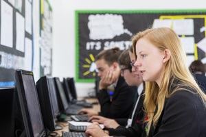 A set of GCSE students working at computers